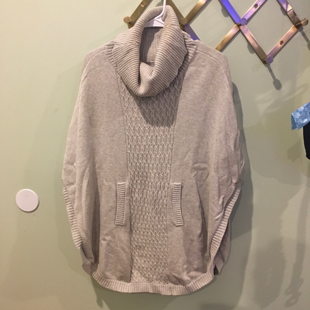 Turtleneck poncho sweater with pocket